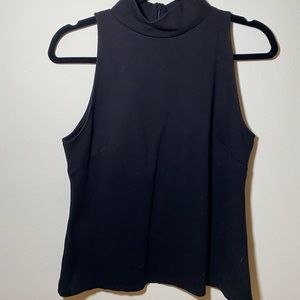 Black sleeveless top with mock turtle neck